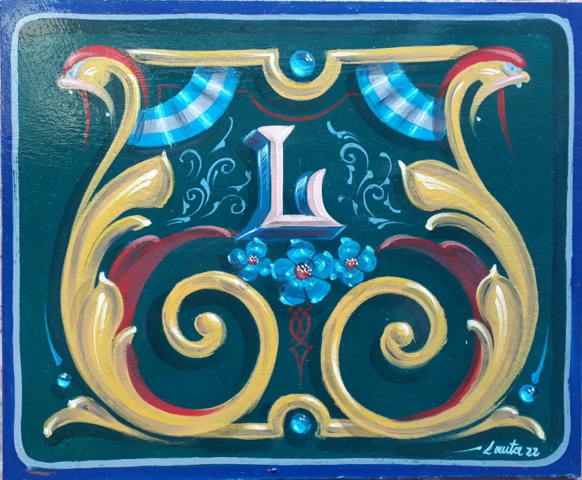 Letra inicial fileteada